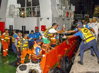 Sri Lanka Navy brings 25 Indonesian fishermen ashore at Colombo Port