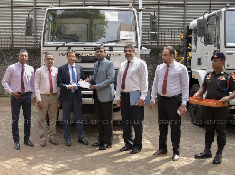 Wrecker and tipper truck handed over to Army and Coast Conservation Department